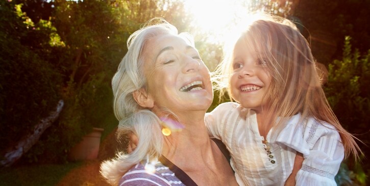 Grandmother and granddaughter soaking up vitamin D