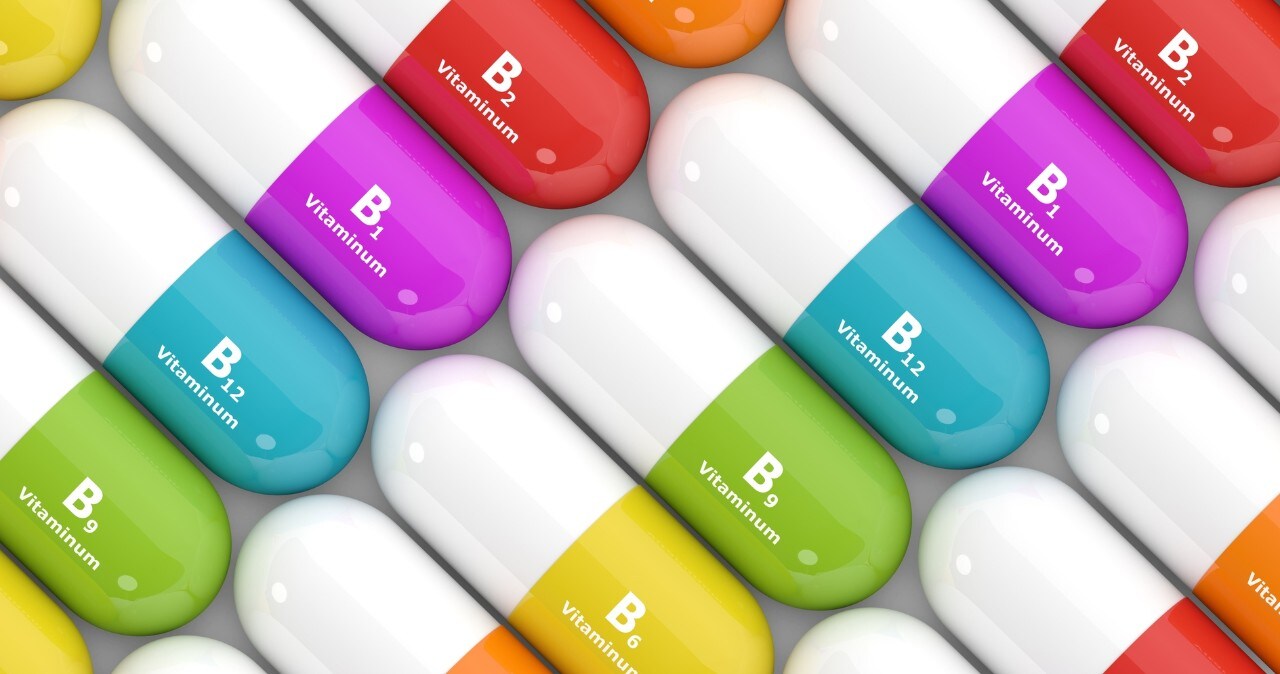 3d rendering of group B vitamin pills over white background