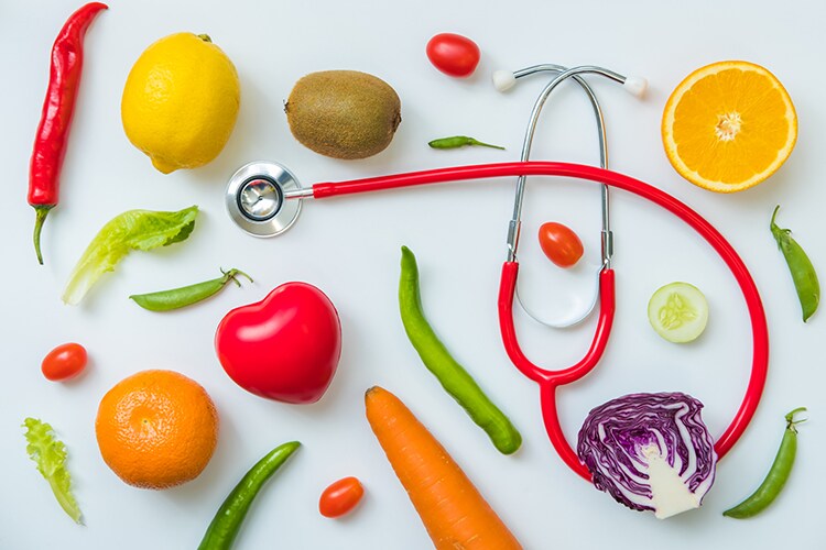 a selection of fresh vegetables for a heart healthy diet as recommended by doctors and medical professionals